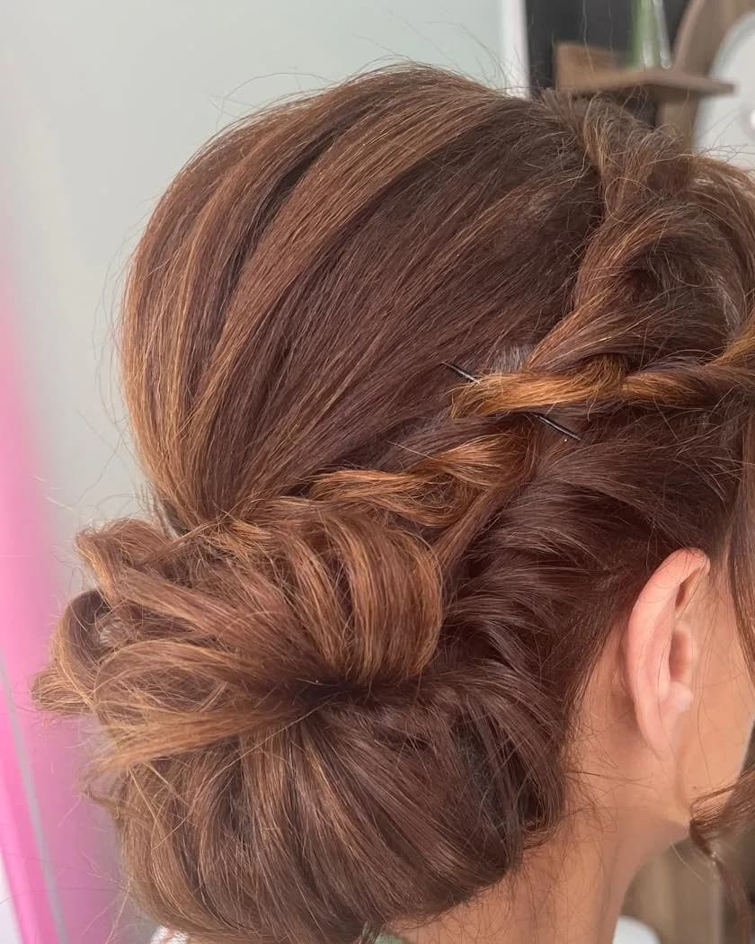 Occasion hair — braided low bun